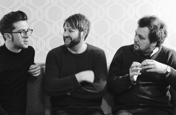 Image of Jim Unwin, Chris Smith and Richard Turner the founders of Twisted Noise Troupe sitting together.